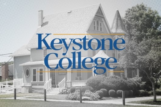 A photograph of a building on Keystone College’s campus, with the name of the college superimposed on it.
