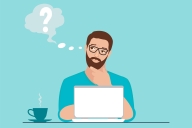 Man sits before computer and cup of coffee with a question mark coming out of his head