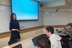 Veronica Stewart, career center director at Bryant University, teaches a lecture to first-year students.