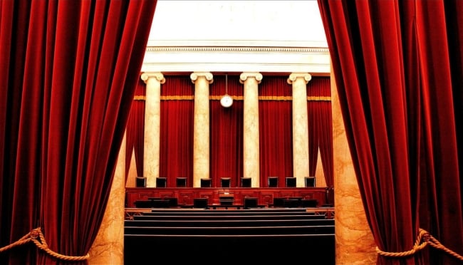 The U.S. Supreme Court, with its red velvet drapes and white columns.