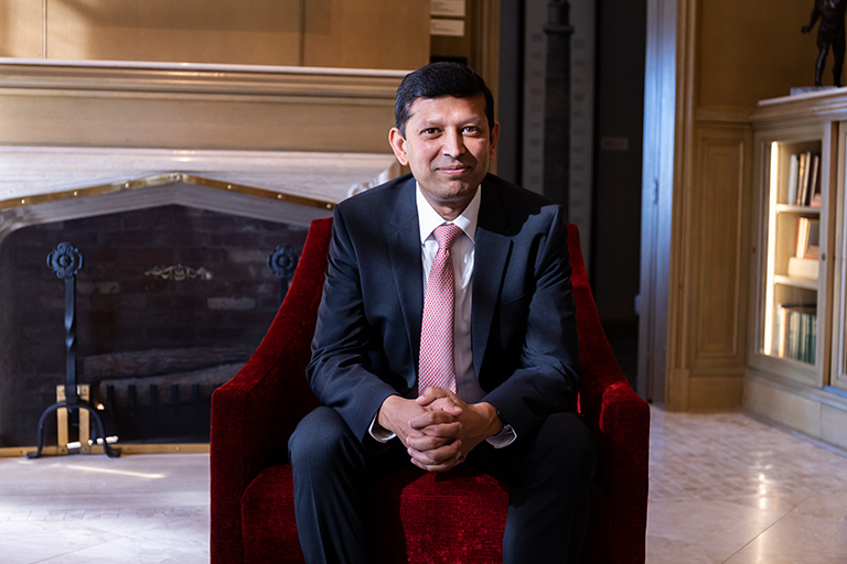 Rahul Shrivastav sits in a chair at Indiana University Bloomington 