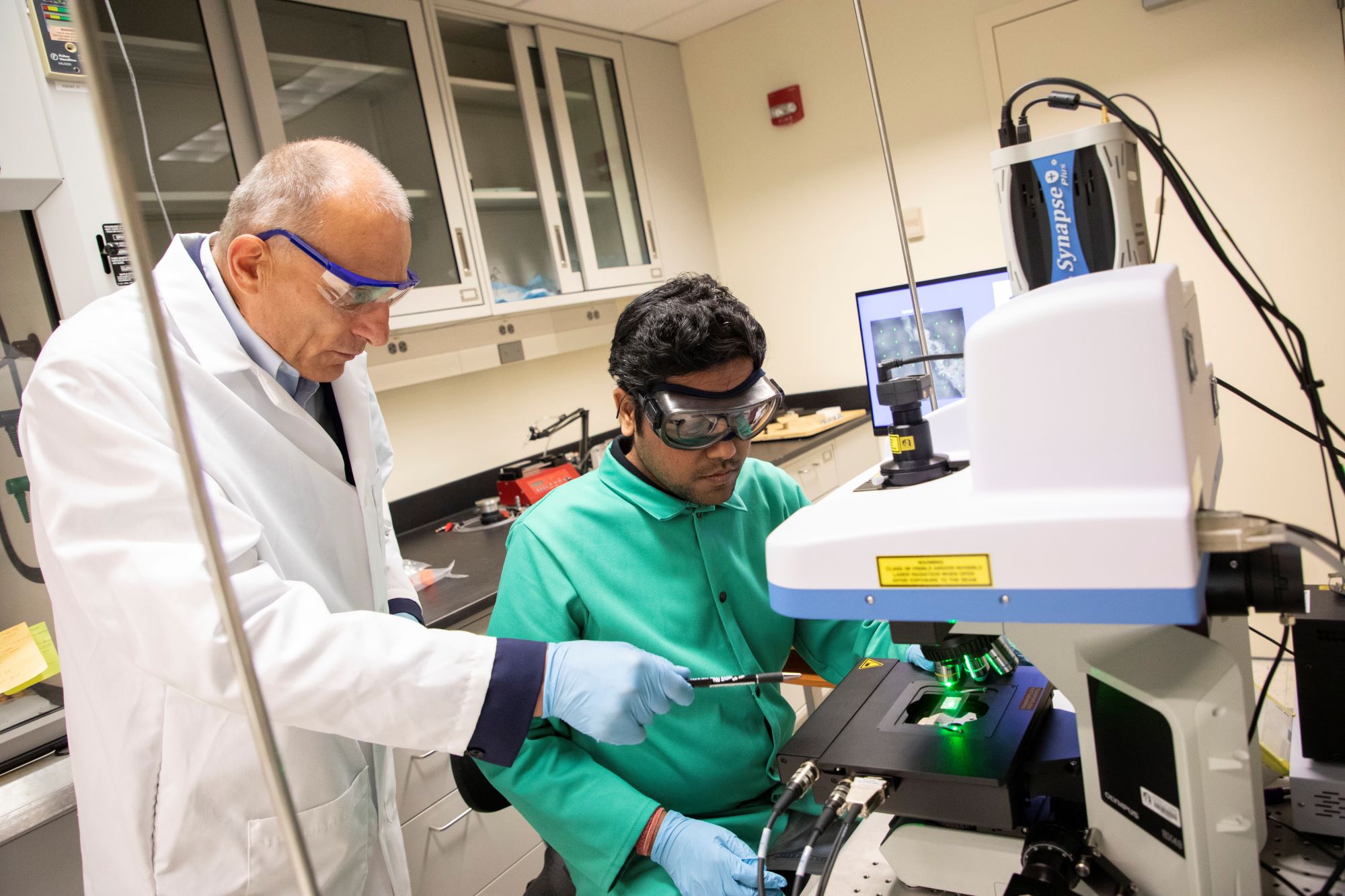 University at Albany student and professor AI biochem lab