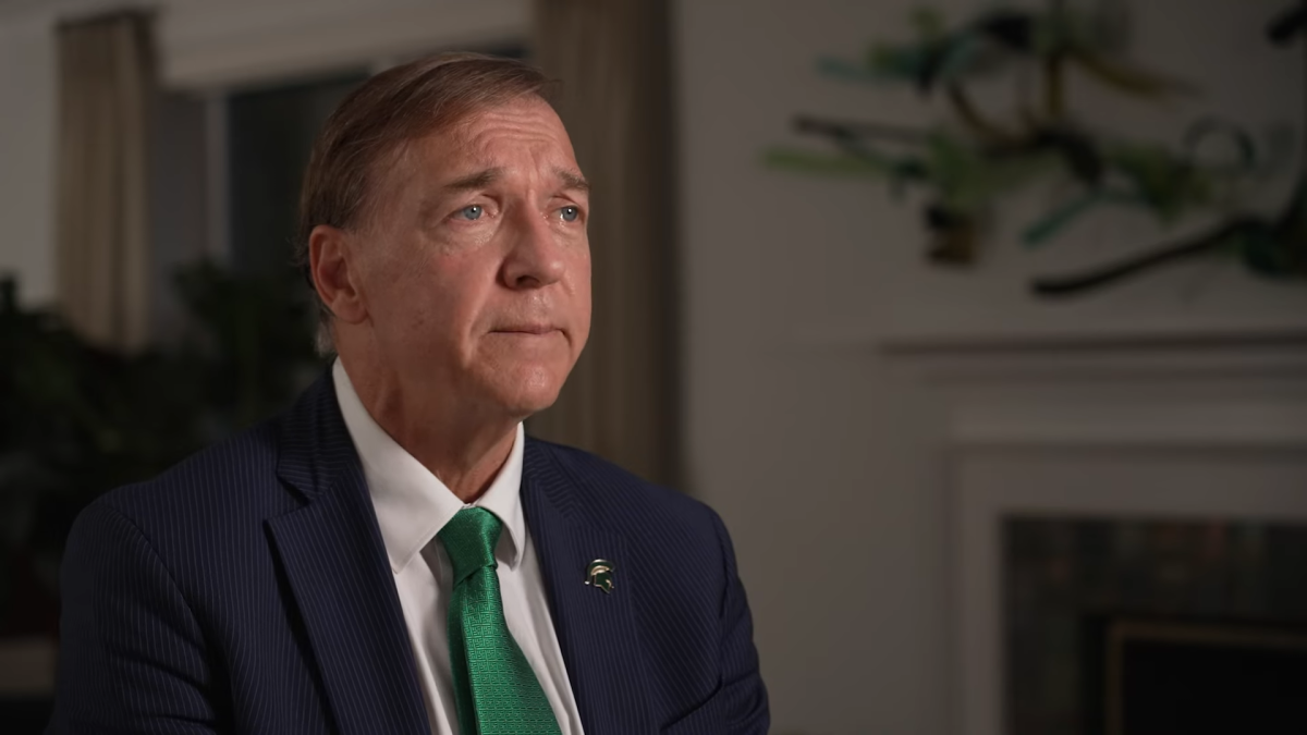 Michigan State president out after battle with trustees
