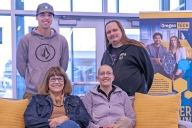 Four Oregon Institute of Technology students smile for a photo.