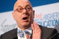 Leon Botstein, a bald white man with round glasses and wearing a bow tie, pictured at an event