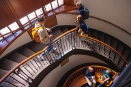 Students traversing a staircase on the DePaul University campus.