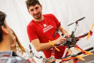 A University of Nebraska-Lincoln student holds a drone.