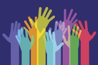 Illustration: Group of hands of all different colors outstretched and raised in the air