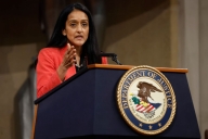 A woman talks at a podium