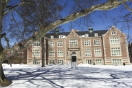 A photograph of a Vassar College building in the snow.
