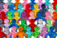 An illustration depicting a collection of people, in a variety of colors.