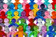 An illustration depicting a collection of people, in a variety of colors.