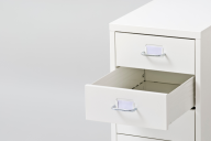 An open drawer in a filing cabinet.
