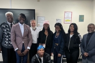 Students at South Carolina State University stand smiling with Meir Muller and Devin Randolph. 