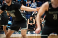 Robert McRae III #23 of the Dartmouth Big Green watches his team play against Columbia Lions in their NCAA men’s basketball game on February 16, 2024