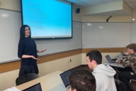 Veronica Stewart, career center director at Bryant University, teaches a lecture to first-year students.