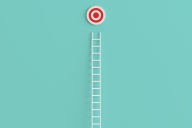 Ladder leading up to a red-and-white bull’s eye