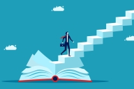 Man holding briefcases looks up long stairway emerging from a book as if wondering how to get to the top