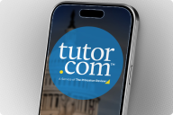 A cell phone is in the center of the photo—on the screen is the circular blue logo for Tutor.com.
