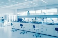 A silver-toned photo of a gleaming, modern empty science laboratory.