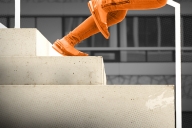 Two shoes falling down a staircase