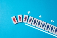 An illustration of characters being pushed off of a line.