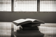 Books in a prison cell