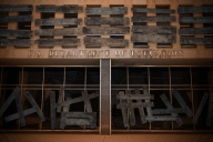 A photo illustration of a boarded-up Department of Education building