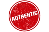 A circular red and white badge with the word "Authentic."