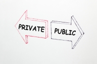 The words "private" and "public" are written in two arrows, pointing in opposite directions, against a white background.