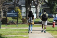 A photo of students walking on Saint Augustine's University's campus.