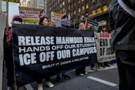 A photo of demonstrators with a large banner saying "Release Mahmoud Khalil Hands Off Our Students ICE Off Our Campuses Shut It Down for Palestine."