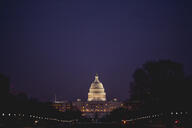 An image of the U.S. Capitol building at night.