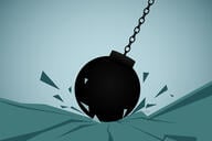 An illustration of a wrecking ball hitting ground.