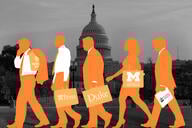 Individuals in business attire with college logos on their briefcases walking in front of the US Capitol building.