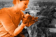 A lab worker over an aerial shot of the University of Arizona campus.