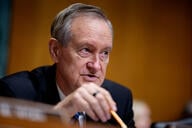 Sen. Mike Crapo holds a pencil