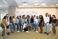 A group of Upward Bound students pose and smile at Montgomery County Community College