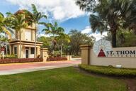 Palm trees surround the entrance to St. Thomas University.