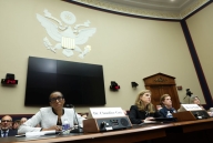 Presidents of Harvard, Penn and MIT sit at a table in front of the House Education and Workforce Committee.