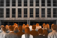 A photo illustration of workers standing in front of the Department of Education.