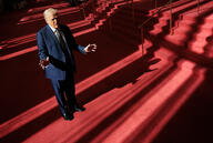 President Donald Trump gestures in the Grand Foyer of the John F. Kennedy Center for the Performing Arts.