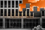 Illustration showing the Education Department building taken apart brick by brick
