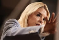 US Attorney General Pam Bondi, a blonde white woman wearing a blue blazer.