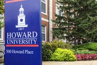 Banner on Howard University campus with the university's name on it