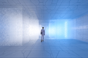 Lone woman walks with back to viewer in a futuristic room