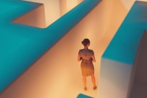 Illustration of female professional standing in a large maze