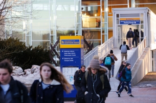 Students walking around on the campus of University of Southern Maine.