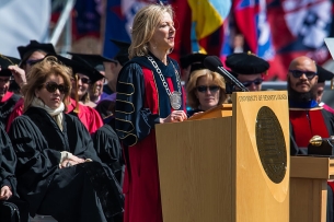 Former University of Pennsylvania president Amy Gutmann, a light-skinned blonde woman, speaking at commencement in 2015.
