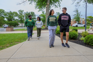 MCCC and Rider students walk together on Rider University's campus in New Jersey.